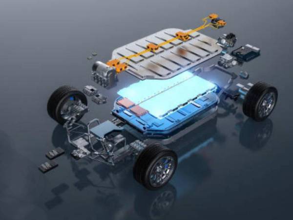 Mobile technician running diagnostic scan on electric vehicle battery health in Melbourne